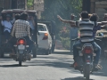 The people of Rajasthan were generally very friendly. Here, three locals on one bike are posing for some tourists on a tuk-tuk. Look closely, no one is holding the bike's handle bars.