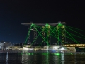 Laser light show at night in Singapore.
