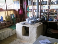 This is what the common teahouse kitchen looked like. The stove was earthen / brick and all the food was cooked on top.